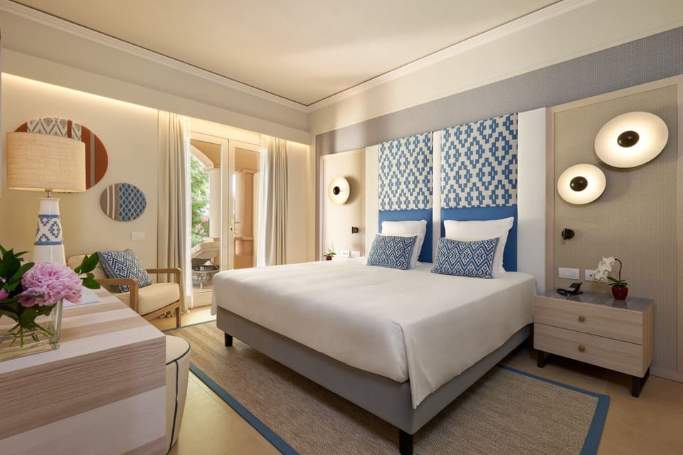 Premium bedding, down comforters, minibar, in-room safe