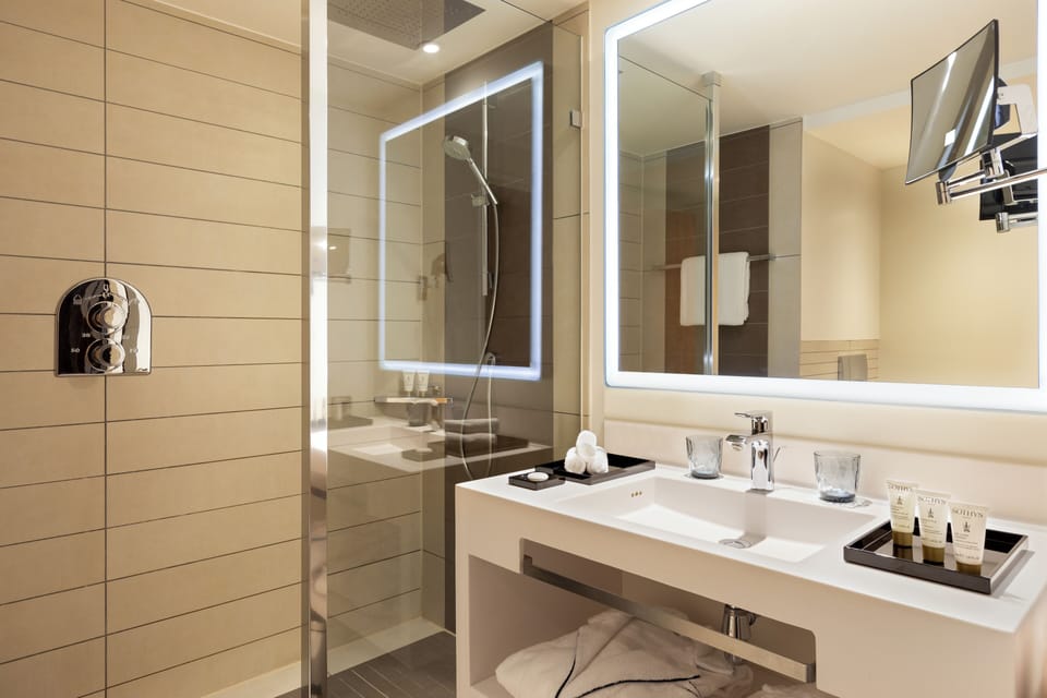 Eco-friendly toiletries, hair dryer, bathrobes, slippers