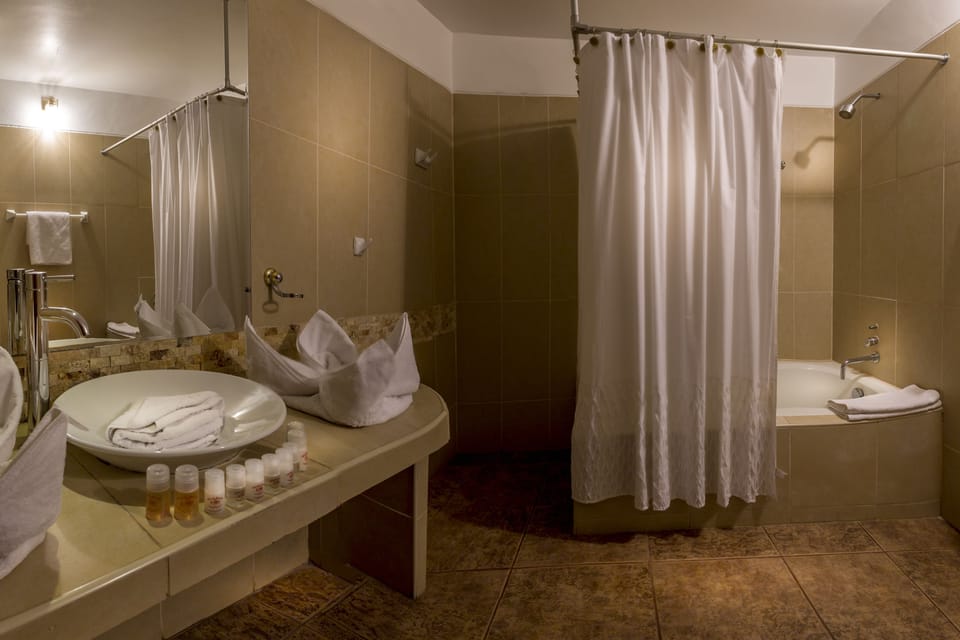 Superior Triple Room | Bathroom | Shower, designer toiletries, hair dryer, towels