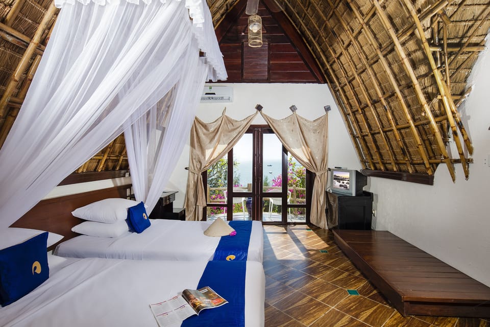 Deluxe Villa, Beachfront | Down comforters, minibar, in-room safe, desk