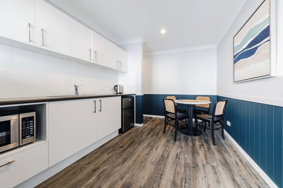Deluxe Two Bedroom Apartment | Private kitchen | Coffee/tea maker, fridge, electric kettle