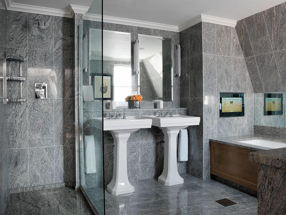 Shower, designer toiletries, hair dryer, bathrobes