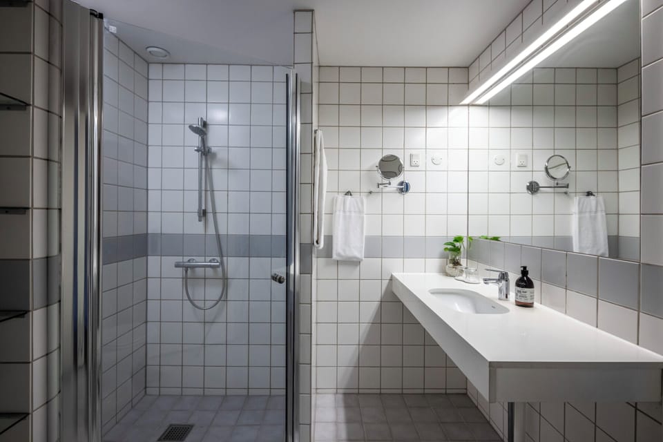 Junior Suite, 1 Bedroom, Park View | Bathroom | Shower, eco-friendly toiletries, hair dryer, towels