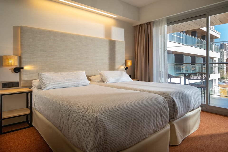 The Innside Sea View Room | Minibar, in-room safe, desk, iron/ironing board