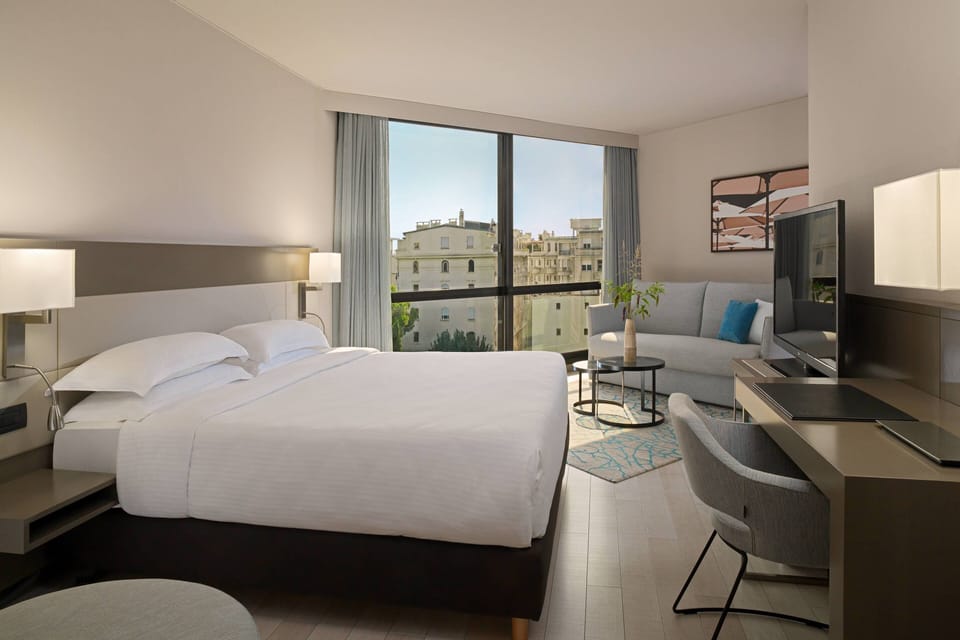 Junior Room, 1 King Bed with Sofa bed, Sea View | Premium bedding, in-room safe, desk, laptop workspace