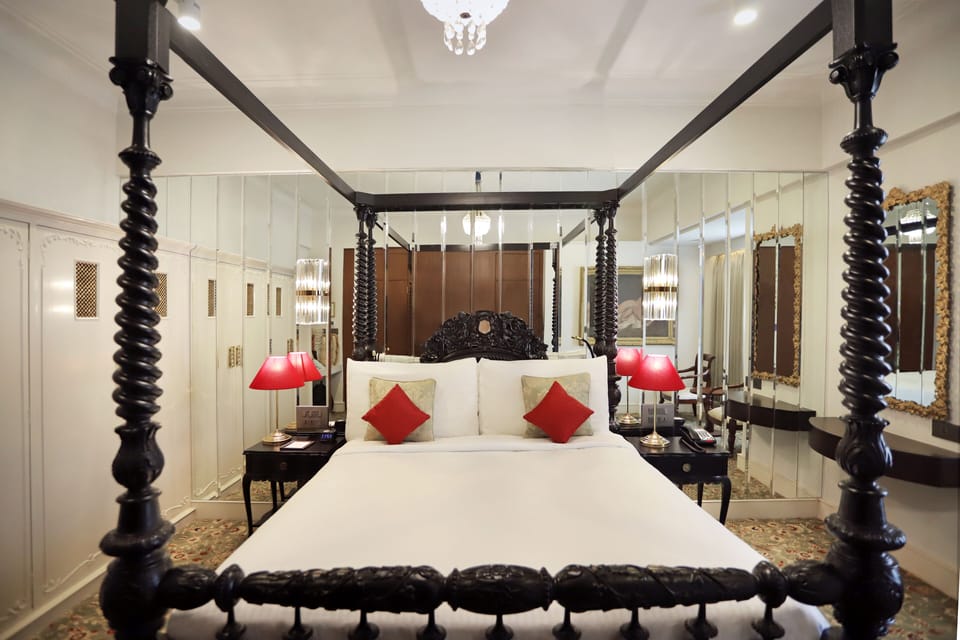 Luxury Suite | In-room safe, desk, blackout drapes, iron/ironing board