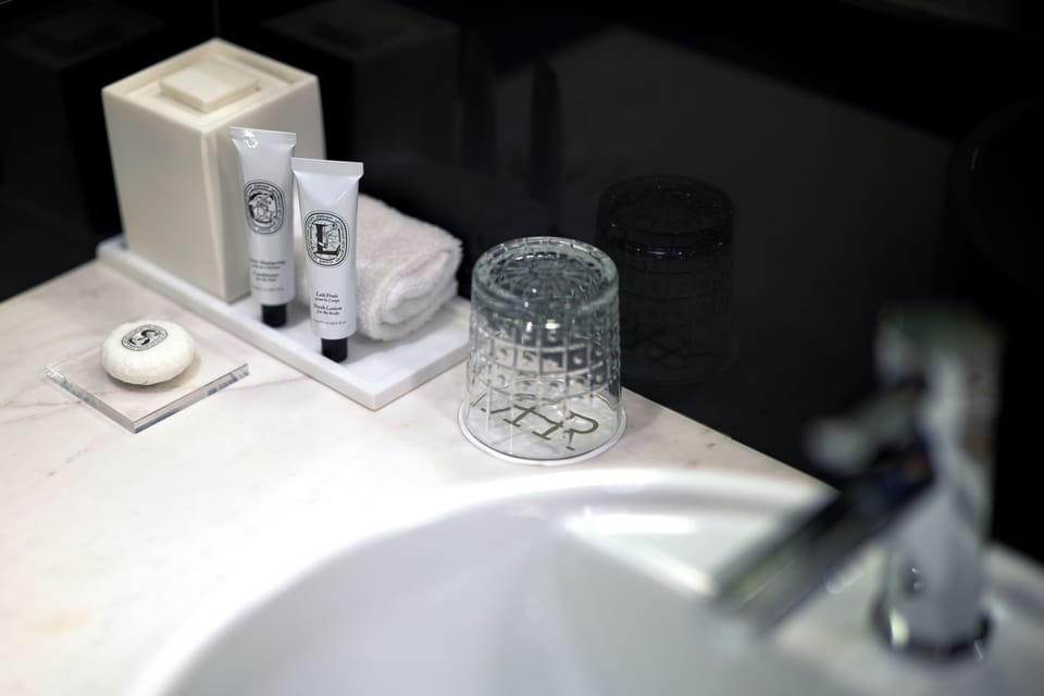 Suite and Balcony | Bathroom | Designer toiletries, hair dryer, bathrobes, slippers