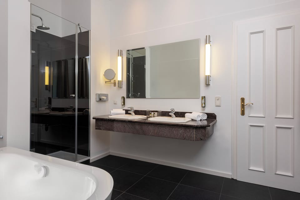 Shower, eco-friendly toiletries, hair dryer, towels