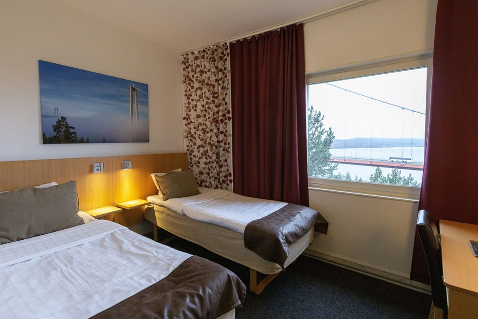 Double Room, River View | Desk, laptop workspace, blackout drapes, iron/ironing board (on request)