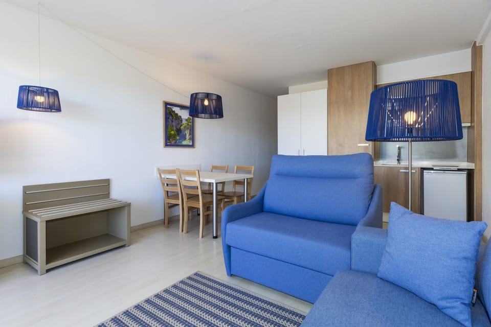 Family Apartment, Terrace, Annex Building (Spa Access) | Living area | 24-inch flat-screen TV with digital channels
