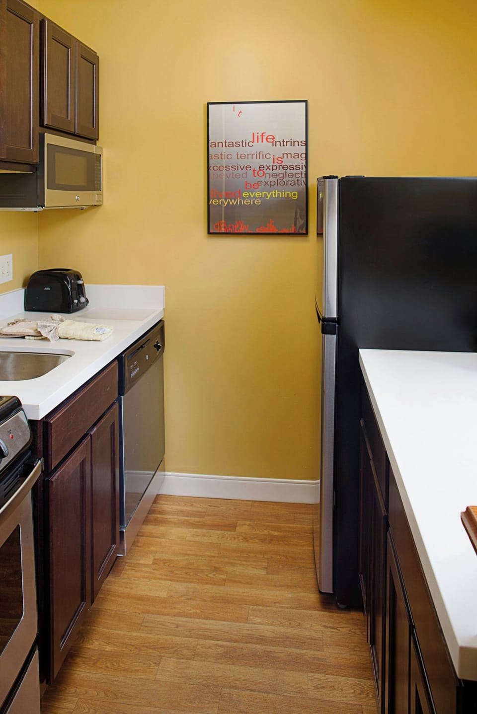 Studio, 1 Queen Bed with Sofa bed | Private kitchen | Full-size fridge, microwave, oven, stovetop