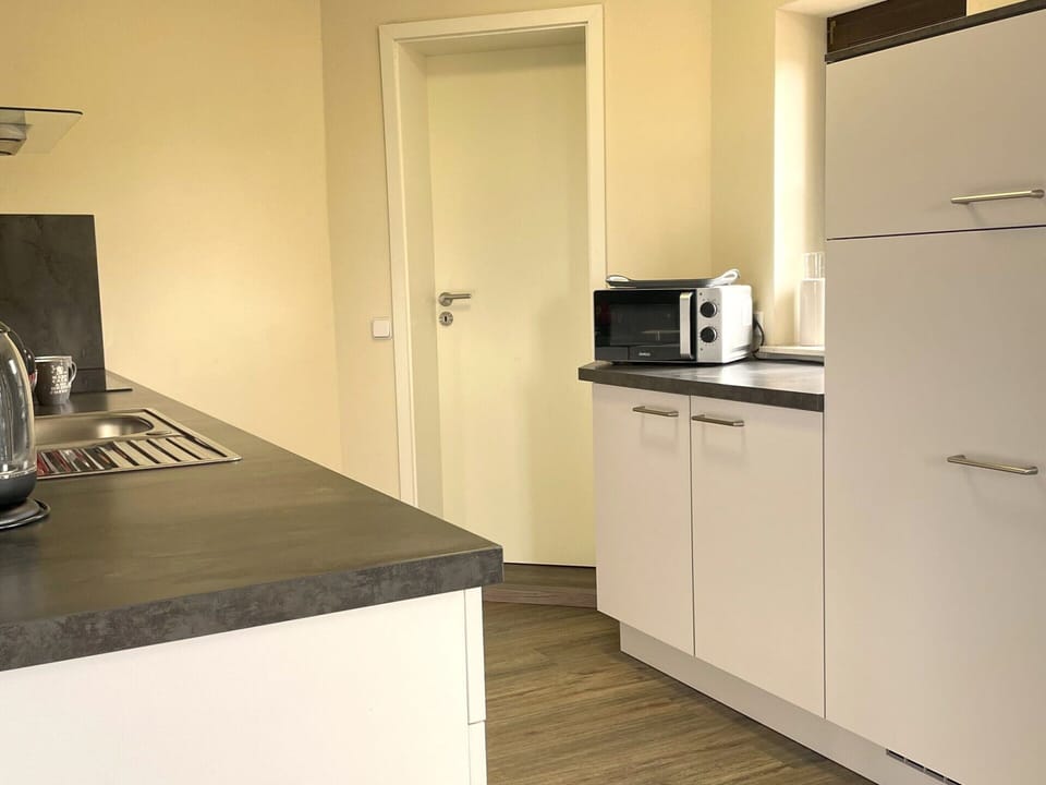 Apartment | Private kitchen | Stovetop, dishwasher, highchair