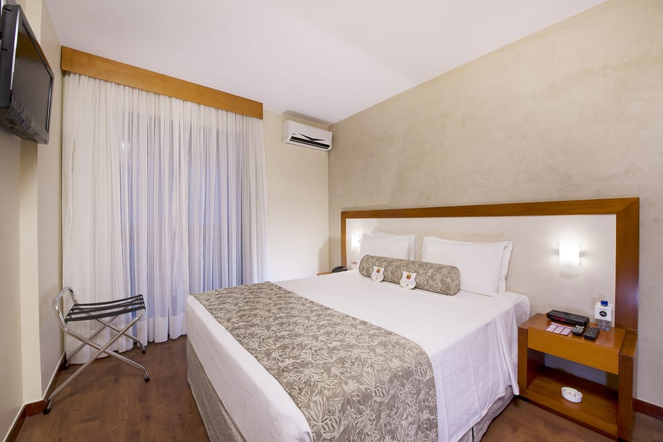 In-room safe, desk, blackout drapes, free cribs/infant beds