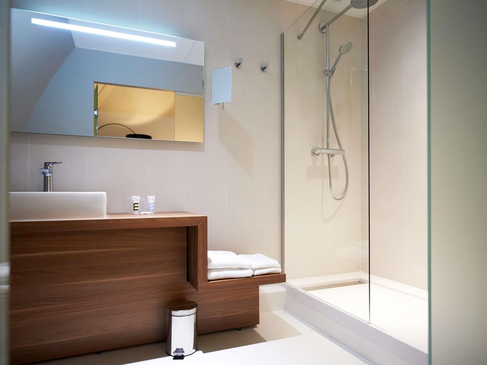 Shower, rainfall showerhead, eco-friendly toiletries, hair dryer