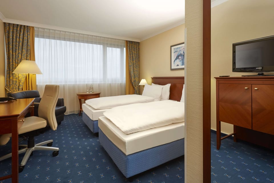 Hypo-allergenic bedding, in-room safe, desk, laptop workspace