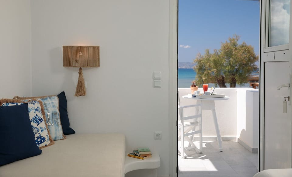 Standard Triple Room, Balcony, Sea View (1st floor) | Premium bedding, in-room safe, blackout drapes, iron/ironing board