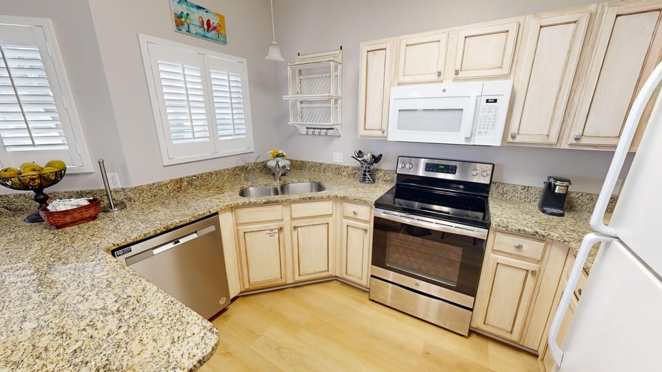 Condo, 2 Bedrooms | Private kitchen | Fridge, microwave, oven, dishwasher