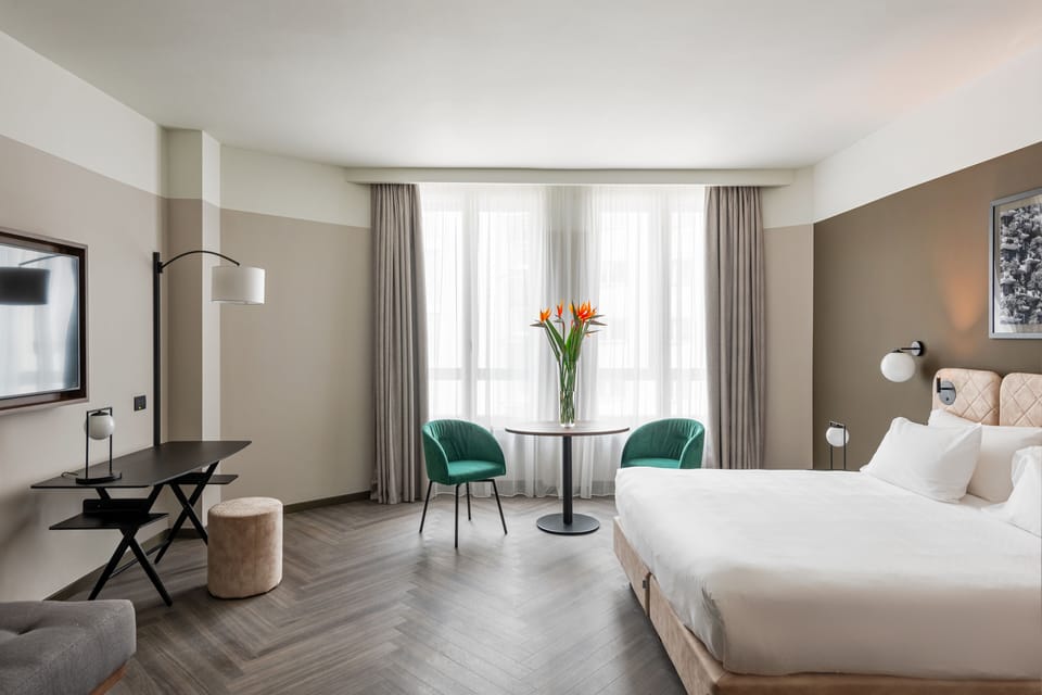 Premium bedding, down comforters, minibar, in-room safe