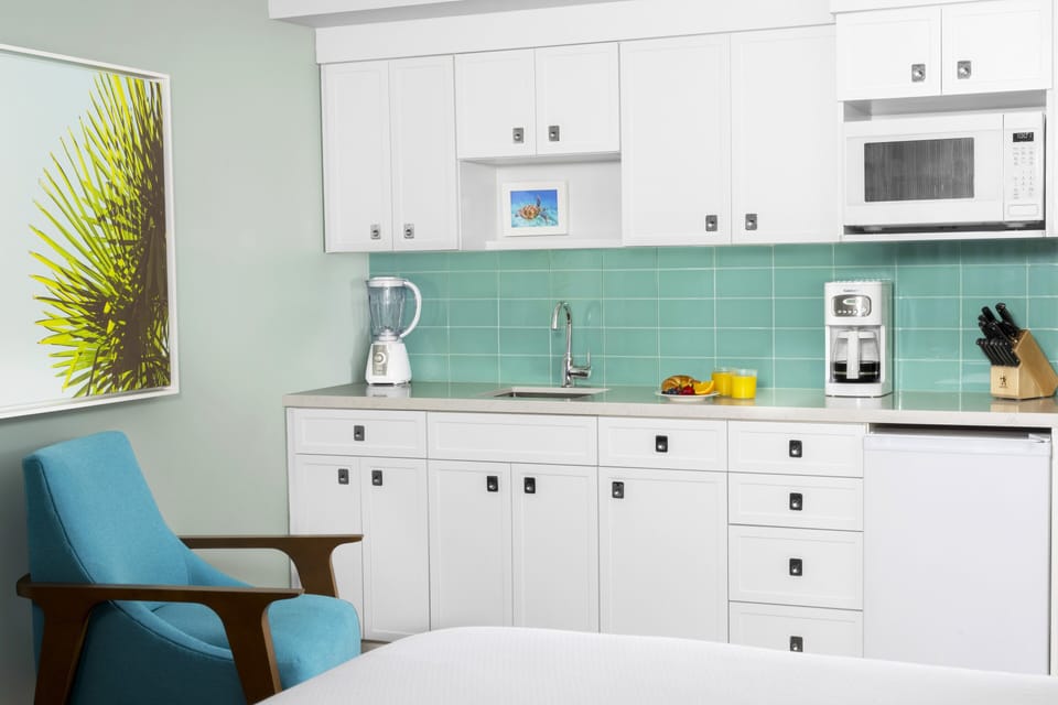 Mini-fridge, microwave, coffee/tea maker, cookware/dishes/utensils