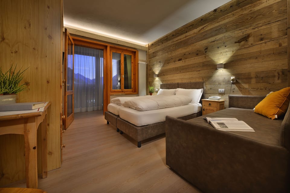 Triple Room, Lanai | In-room safe, desk, free WiFi, bed sheets