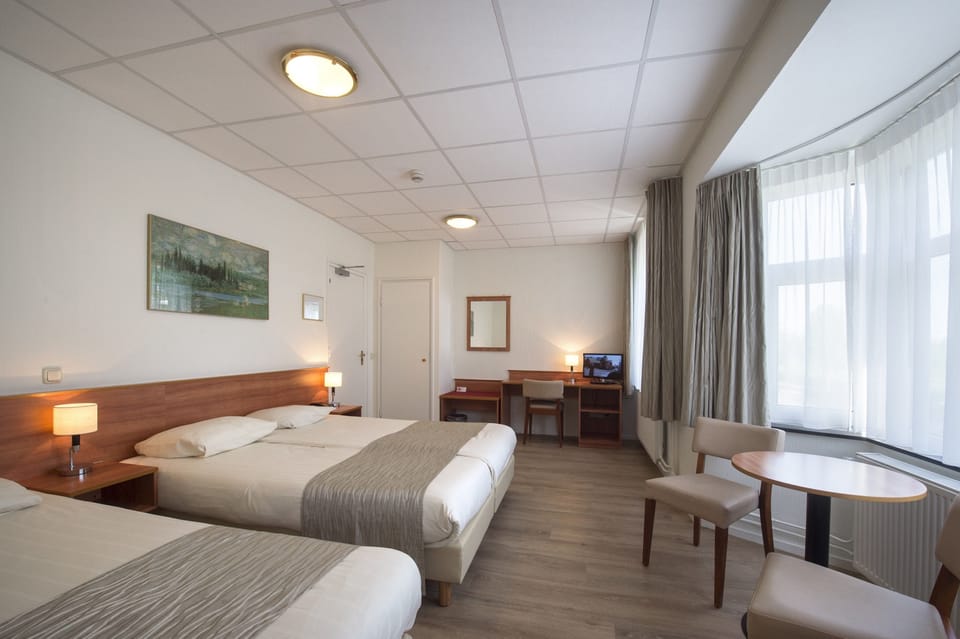 Triple Room | In-room safe, desk, laptop workspace, cribs/infant beds