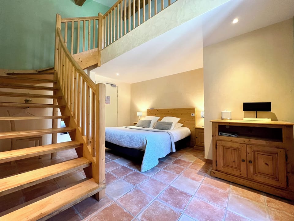 Family Quadruple Room, River View | Premium bedding, in-room safe, individually decorated