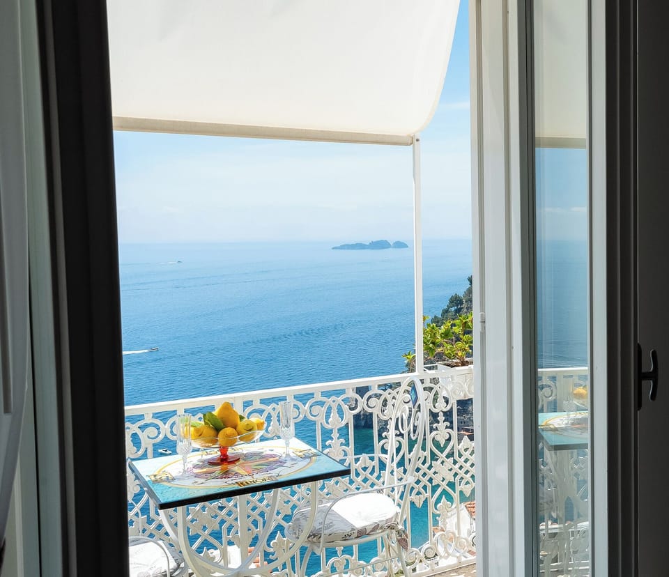 Deluxe Room, Sea View | Terrace/patio