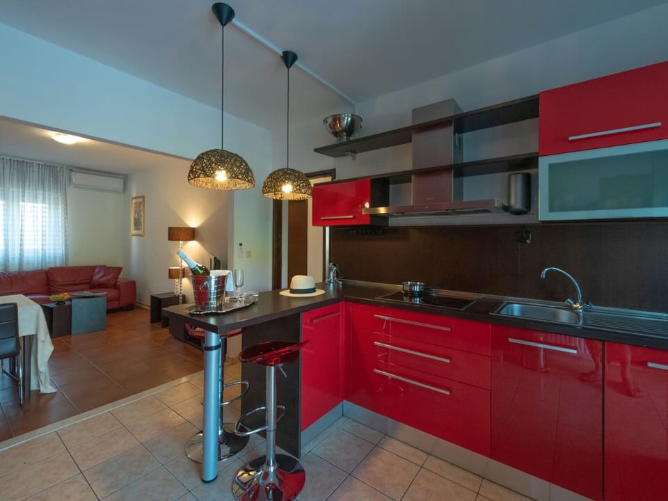 Villa | Private kitchen | Electric kettle, highchair