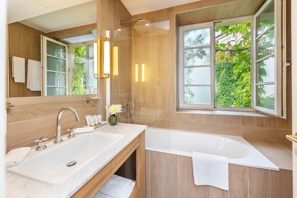 Superior Double Room | Bathroom | Separate tub and shower, rainfall showerhead, designer toiletries