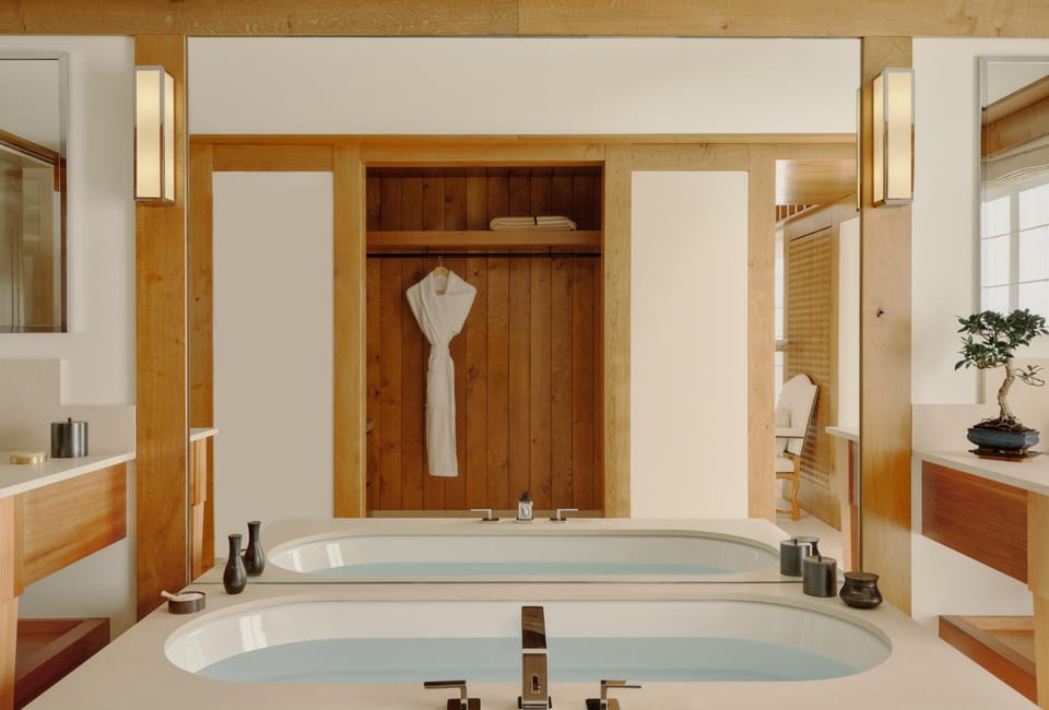 Separate tub and shower, free toiletries, bathrobes, towels