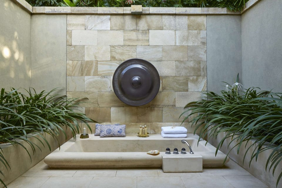 Separate tub and shower, rainfall showerhead, free toiletries