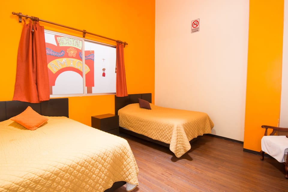Standard Double Room, 2 Queen Beds, Shared Bathroom | Down comforters, pillowtop beds, in-room safe, individually furnished