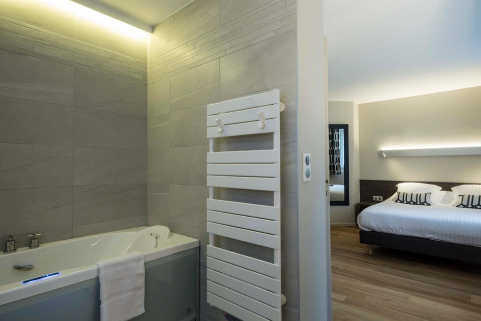 Designer toiletries, hair dryer, towels