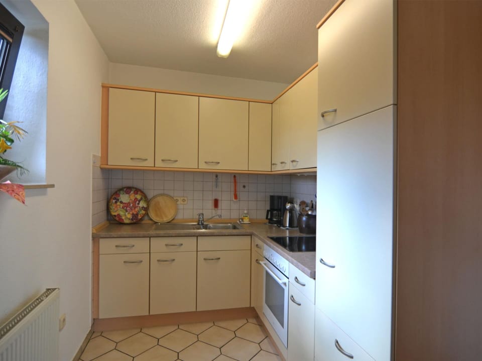 Apartment | Private kitchen | Stovetop, highchair
