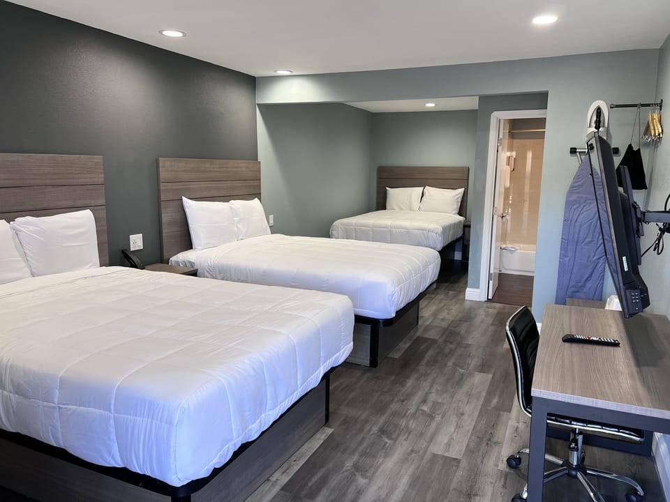 Premium Room, 3 Queen Beds | Desk, iron/ironing board, free WiFi, bed sheets