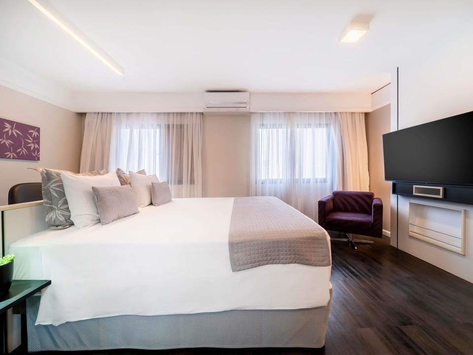 Superior Apartment, 1 Queen Bed | Minibar, in-room safe, desk, blackout drapes