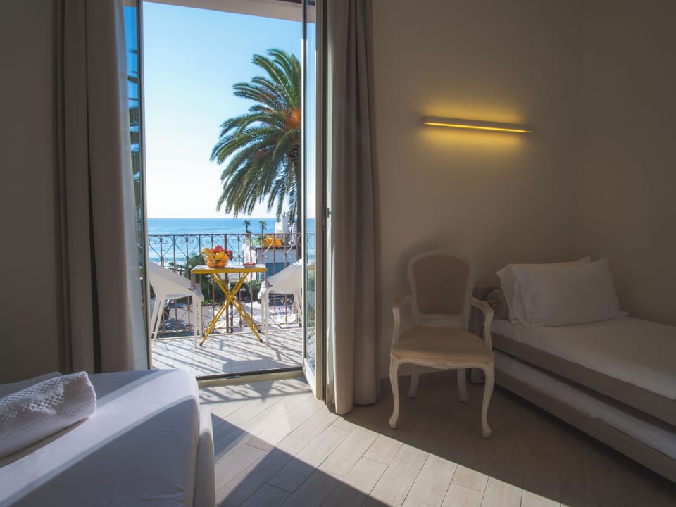 Deluxe Room, Hot Tub, Sea View | Premium bedding, down comforters, minibar, in-room safe