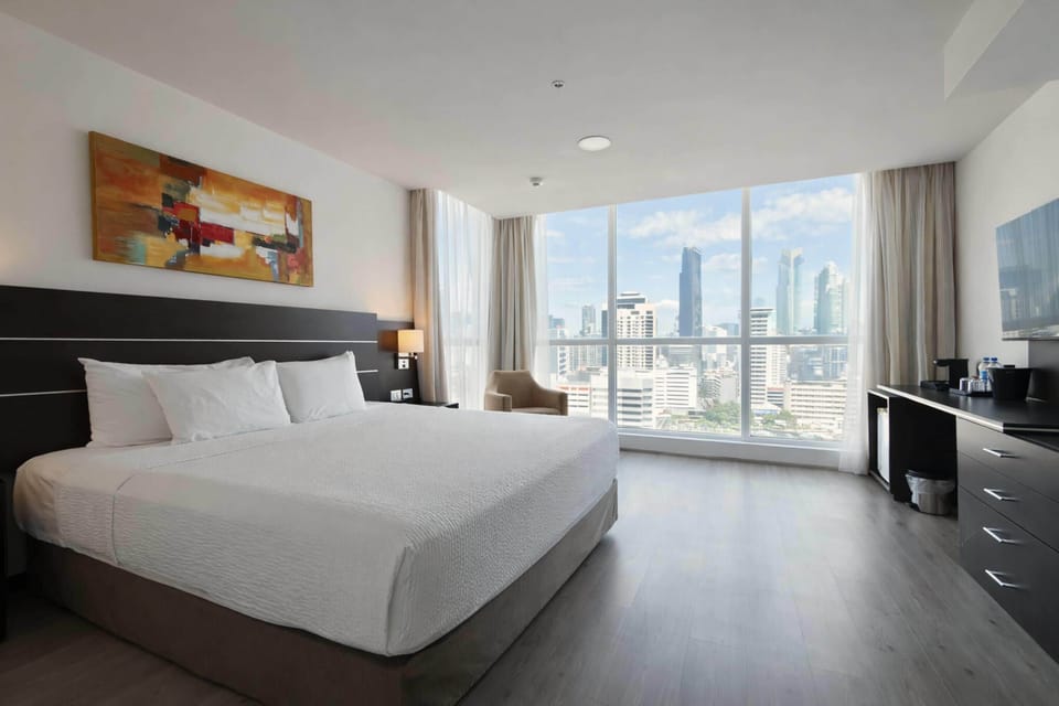 Premium Studio Suite, 1 King Bed, Non Smoking | In-room safe, desk, laptop workspace, blackout drapes