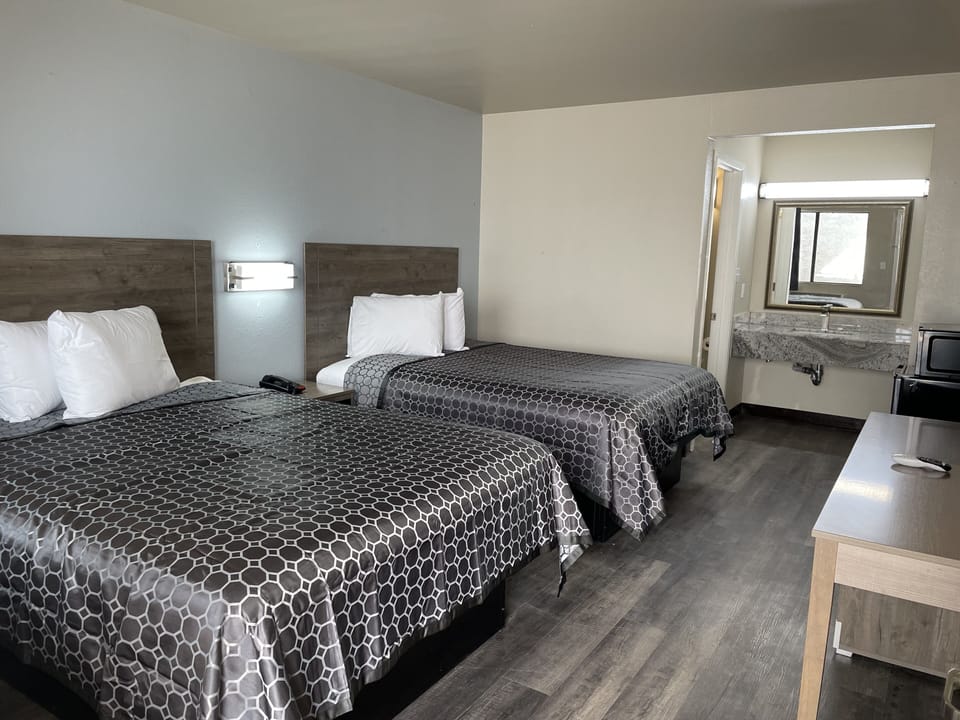 Desk, blackout drapes, free WiFi, bed sheets