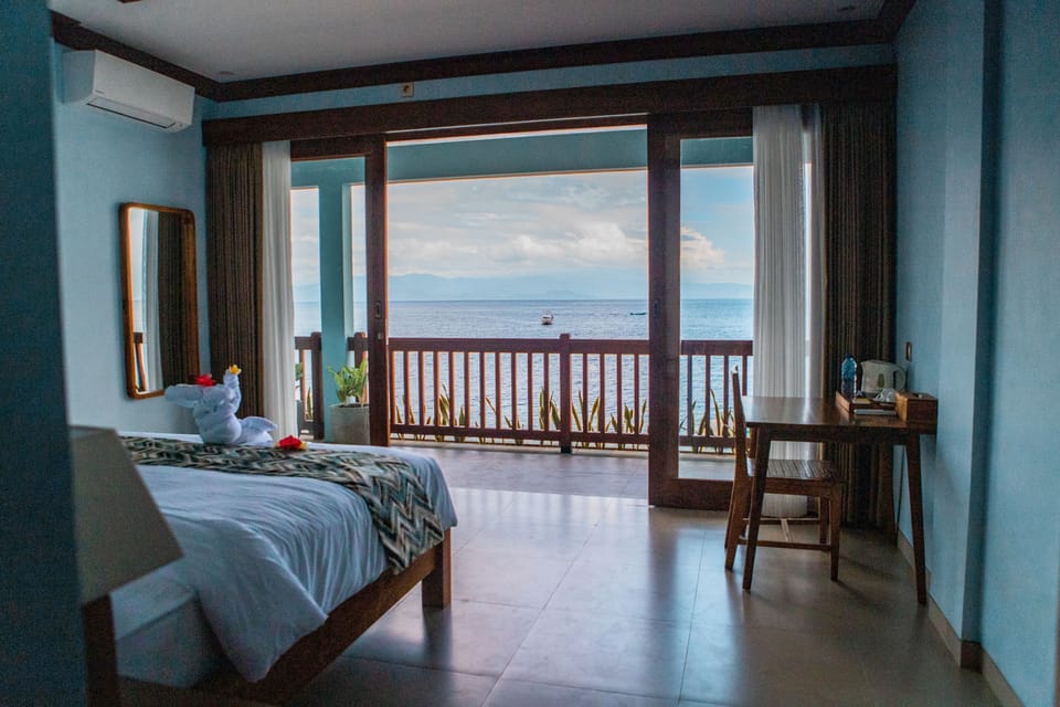 Grand Deluxe Beachfront Upper Floor | Premium bedding, individually decorated, individually furnished, desk