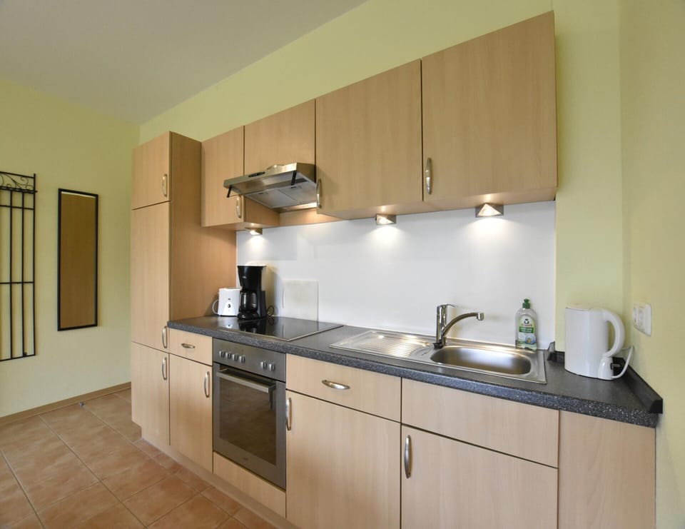 Apartment | Private kitchen | Electric kettle, highchair