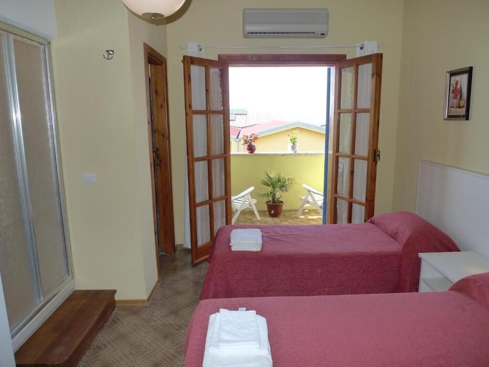 Minibar, desk, bed sheets