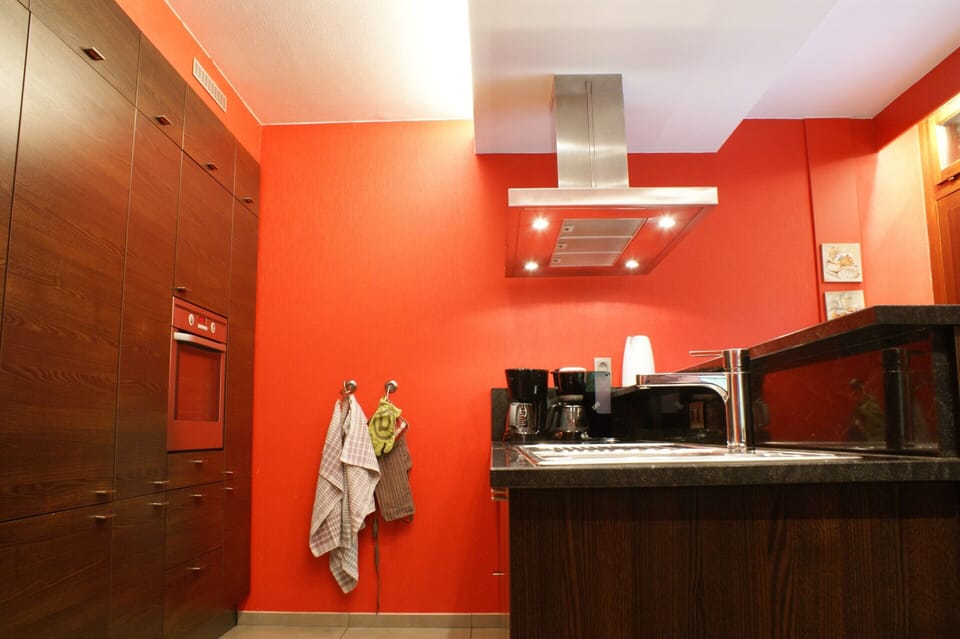 Villa | Private kitchen | Fridge, highchair