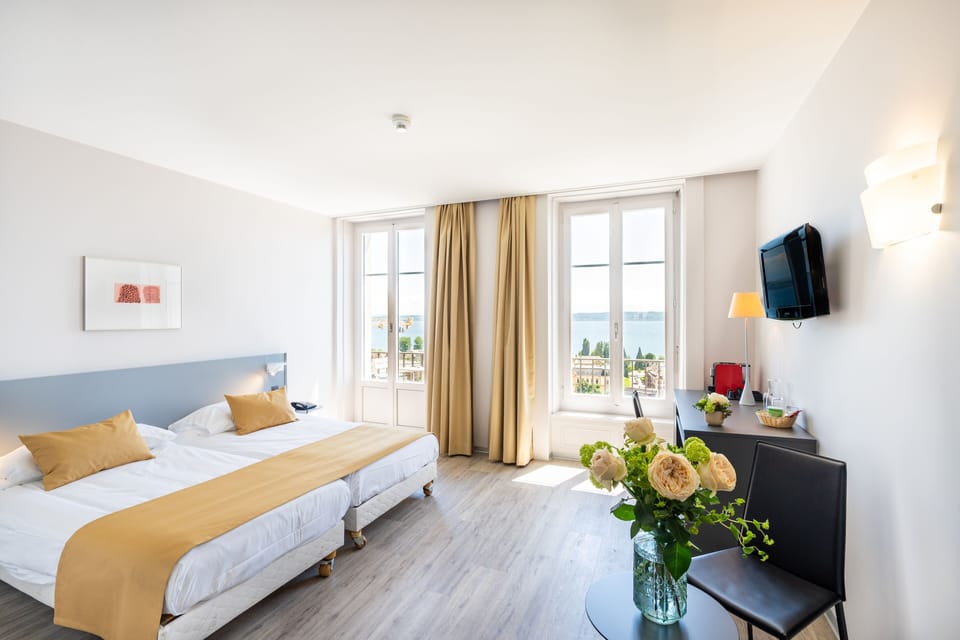 Twin Room, Balcony, Lake View | In-room safe, desk, soundproofing, free cribs/infant beds