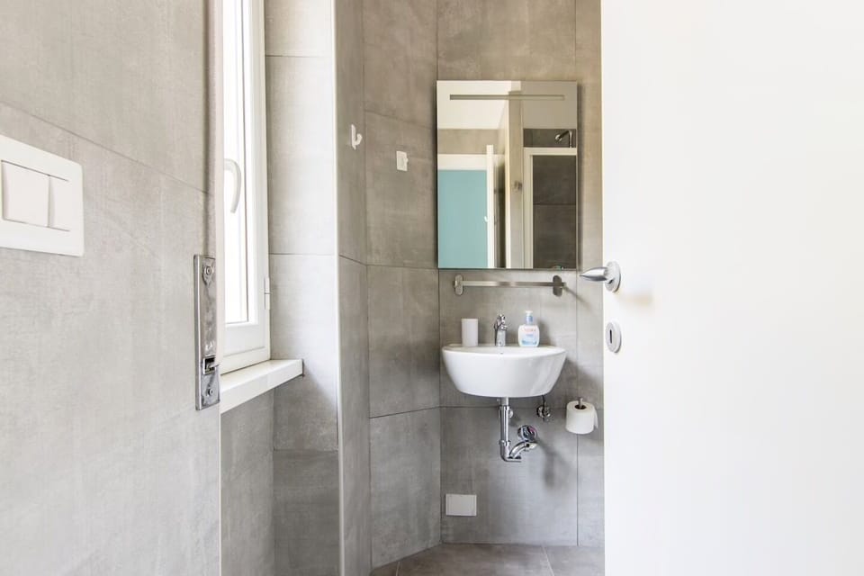 Deluxe Double Room (Light Blue) | Bathroom | Shower, rainfall showerhead, hair dryer, bathrobes
