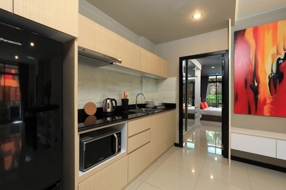 Apartment, 2 Bedrooms, Pool Access | Private kitchen | Full-size fridge, microwave, stovetop, electric kettle