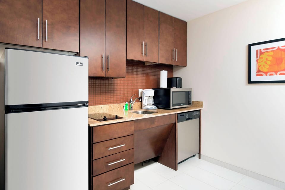 Microwave, stovetop, dishwasher, coffee/tea maker