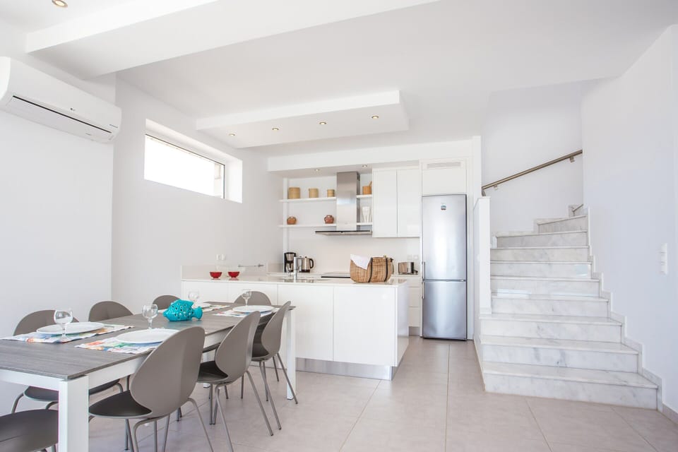 Villa | Private kitchen | Microwave, stovetop, dishwasher, highchair