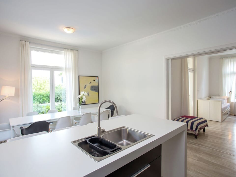 Villa | Private kitchen | Stovetop, coffee/tea maker, highchair, cookware/dishes/utensils