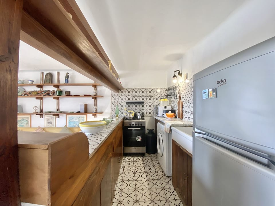 Apartment, 1 Bedroom, Terrace, Sea View | Private kitchen | Microwave, coffee/tea maker, highchair, cookware/dishes/utensils